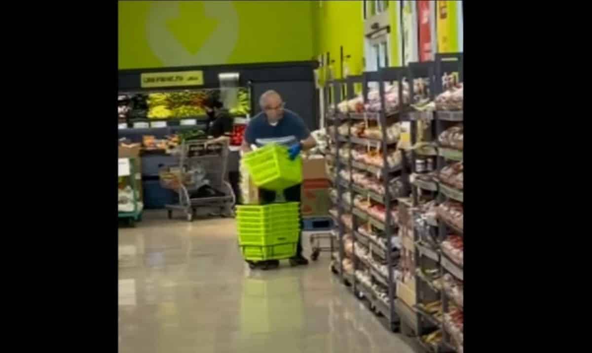 Video Shows Worker Cleaning Shopping Baskets With Spit