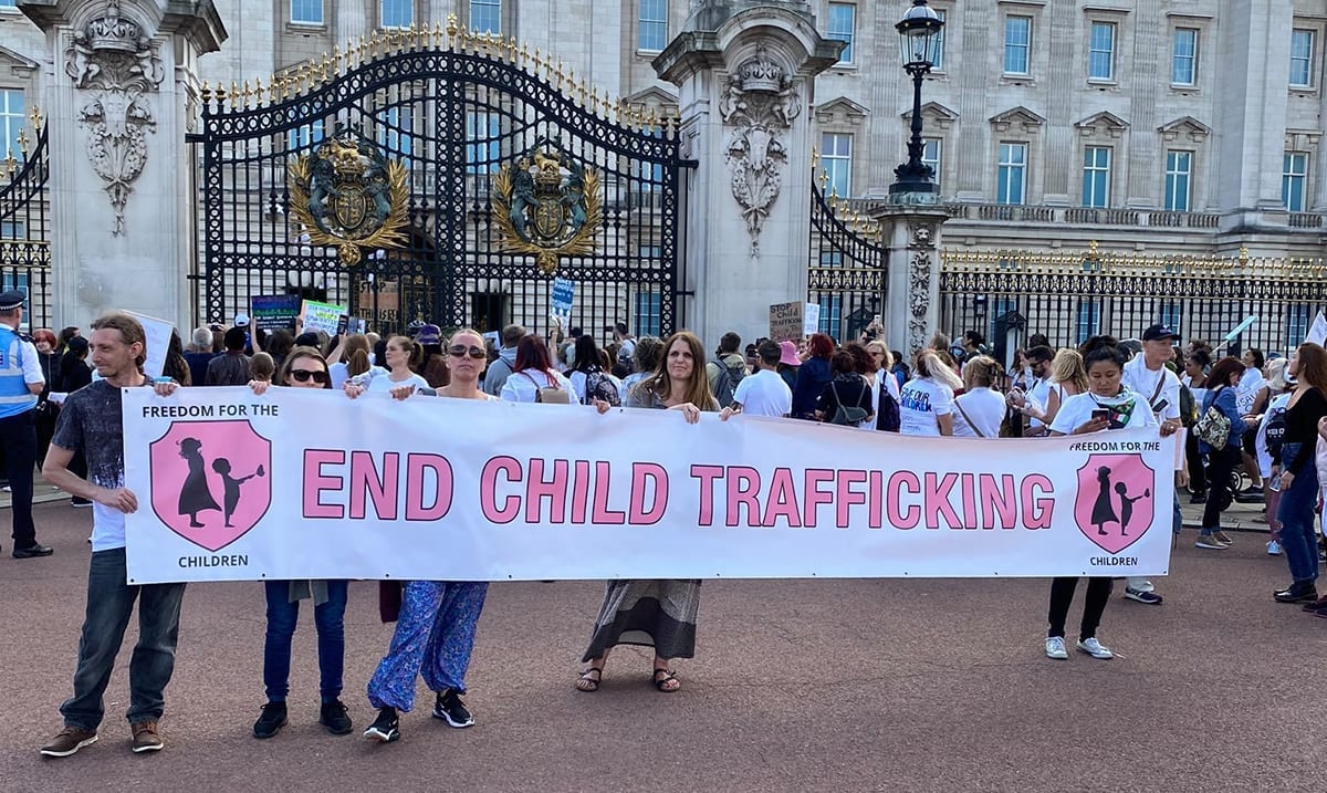 Protestors Gathered Outside Buckingham Palace To Stand Out Against Child Trafficking