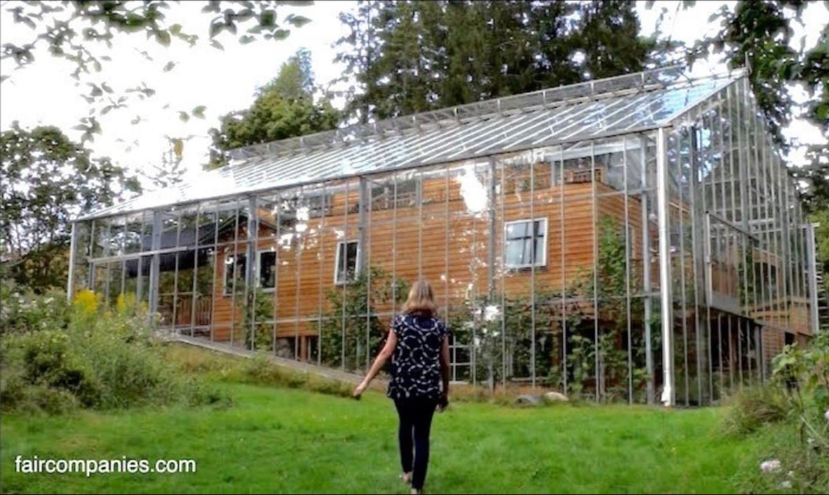 Swedish Couple Builds Greenhouse Around House To Grow Food All Year Long
